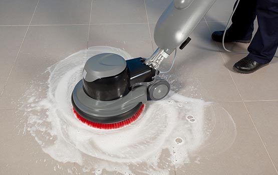 A Group of Professionals Doing Different Steps of Floor Cleaning