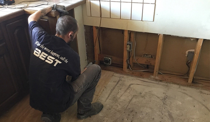 technician restoring electricity connection