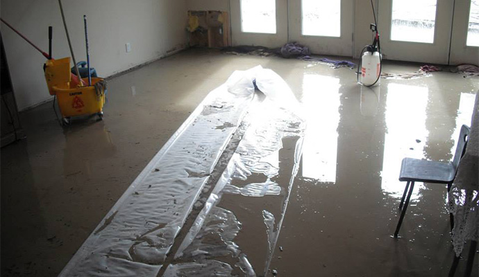 A flooded room water damage restoration